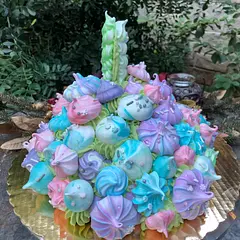 In December, this cake becomes one of two the most often ordered cakes for birthdays, Christmas dinners, and New Year’s Eve parties. I shared winter-themed meringues on Facebook just in time for the new Disney’s Frozen, and the cake became popular.