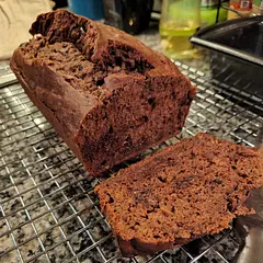 Turned out great! I added 1/4 cup of cocoa powder and about 1/3 cup of chocolate chips (didn't want to go too crazy since I was adding the cocoa). I baked for 47 mins (I used an 8.5" loaf pan) and then another 5 mins with foil tented over it.