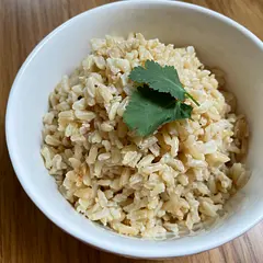 This recipe uses chicken stock and garlic to level up the flavor of the rice. It's the main rice recipe I use and make it at least once a week. 