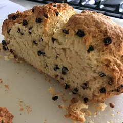 Easy to make. Use currants not raisins. Traditional soda bread is not sweet. This is not sweet. Tastes great with butter and hot tea! Anyone know calorie count?