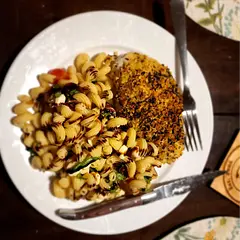 We made an italian crusted chicken to go with this pasta. It was SO good.  The balsamic reduction drizzled on top was a big hit. Will make again.  