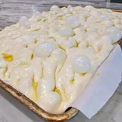 I've made this focaccia a handful of times and I just love it! The overnight rise is a must! I double the recipe to have a large thick focaccia! Sometimes I triple the recipe and then cut mine up into squares and freeze, pull as I need and then  toast for a tasty sandwich my familias favorite!!!!