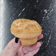 Even my grandma (the greatest kitchen critic) liked it! Here in Brazil we don't make pão de queijo this way, but it worked nicely. BUT I did altered the recipe, and hear me out: it got even better. Put 2tsp of yeast on it, don't be afraid! 🥰