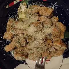 A lot of work to get the dough to the proper consistency.  It took about 3 cups of flour.  They don't taste like sweet potato at all.  The sauce is a must to make it worth the work. 