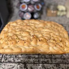 Great recipe! I live at a high altitude, so it took about 34 mins at 420. It also didn’t bake to be as dark brown as in this recipe. But it definitely has a classic golden focaccia coloring. Super crispy, and perfectly salted. My kids loved it as well 😋