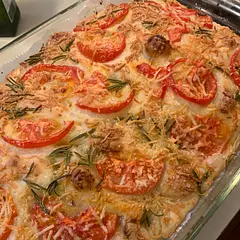 OMG! I made the same day focaccia last weekend which was incredible. I was dreaming about this one all week. I used AP flour last week but got bread flour for this one. The bread was light and moist, crispy on top and just AMAZING! I like the tomatoes on top, it adds moisture I think. Can't wait to make again. It's so little hands on time even though it's an overnight recipe.
