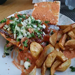 So easy to make, and the Harrisa with mayo is bang on. The salad is lush. I even snacked on the bread with sauce and salad while I waited for the onions and sausages. The caramelised onions are a nice touch.
I put the chips on the side because there was then too much in the bun and I couldn't eat it properly.