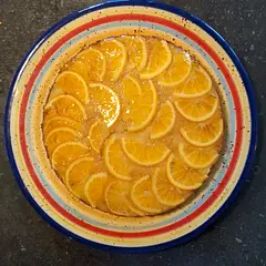 Made this for Mother's Day. Took the sugar water that the oranges were boiled in and added s bit of corn starch to it to make a glaze ( couldn't stand the idea of wasting it). Looks beautiful and moist!