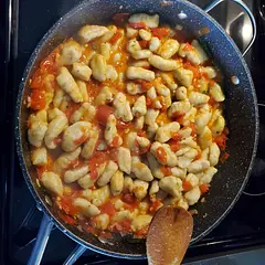 I loved this recipe! I put basil in the sauce and cheese to serve! I used whole tomatoes, since i had no cheery tomatoes. Next time i will make the gnocchi a little smaller and more even in size. Great way to sneak in fiber. Will make again!