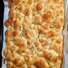 Great recipe and definitely my go-to now! Very easy and made the lightest and fluffiest focaccia. I ended up baking mine about 28 minutes then did add olive oil after as suggested.