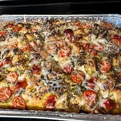 I used this recipe as a base for my dough, it was perfect, moist, crispy crust! I topped it with roasted tomatoes & garlic with some fresh pesto and Parmesan. I noticed my oven runs lower heat, so I ended up baking closer to 30-35 mins 