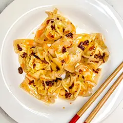 Fun activity for a cold winter day. I used about 3/4 tsp salt in the filling, boiled for 3 minutes, and tossed in chili crisp oil to serve. Delicious. With approx 1 tsp filling in each wrapper, this makes 60-70 dumplings. 