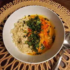 I made a lot of mods based on what's available to me. Used broth instead of water, thai peppers, choy sum instead of kale, added fresh tumeric. I used some of the coconut milk and broth in the rice cook. I let everything cook low and slow so it took about 2 hours total. I have no doubt it would be good without these changes. Amazing dish and so healthy!