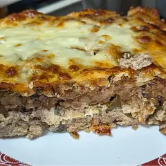 The only negative thing my husband had to say about this was the cheese on top came off all at once when he cut into it to take his first bite. The leftovers will make great sandwiches. 