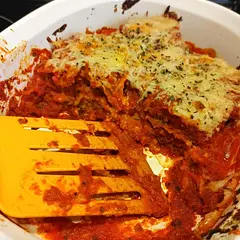 This is now my boyfriend's favorite lasagna! I split the recipe between two smaller baking dishes so we could eat one now and freeze one for later. It was really good. 