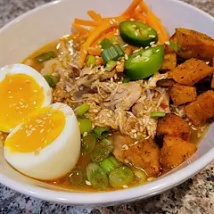 The BEST ramen!!! This recipe is well worth the effort. Serve with jammy ramen eggs, green onions, toasted sesame seeds, sliced jalapenos, etc. Edited to say this works with pork and chicken thighs.