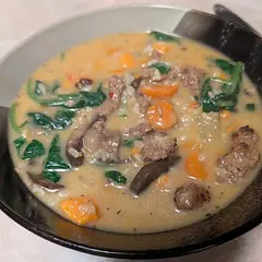Great, but I made lots of recipe modifications.
Added 1 lb mild Italian sausage
An extra carrot
Italian seasoning instead of Old Bay
Brown rice instead of wild rice - Local stores here don't have wild rice outside of par-cooked options.
Three handfuls of baby spinach instead of kale
I didn't do it because the family doesn't like spice like I do, but crushed red pepper would be a great addition.
Be generous with the salt at the end.