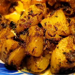 I used yellow potatoes. I omitted the green chili, and the potatoes were still a bit spicy. I only used 1/2 teaspoon of Kashmiri chili powder. The order of ingredients is not sequential, and I had to scroll between the ingredients and the directions constantly.