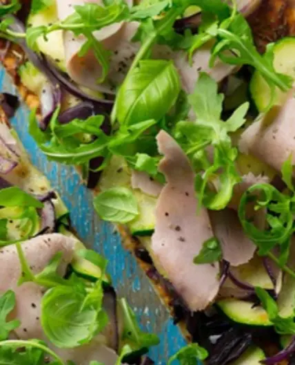 Courgette, rocket & ham pizza
