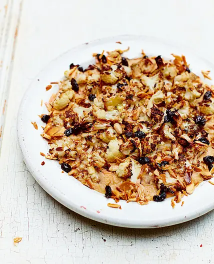 CAULIFLOWER KORMA WITH BLACKENED RAISINS