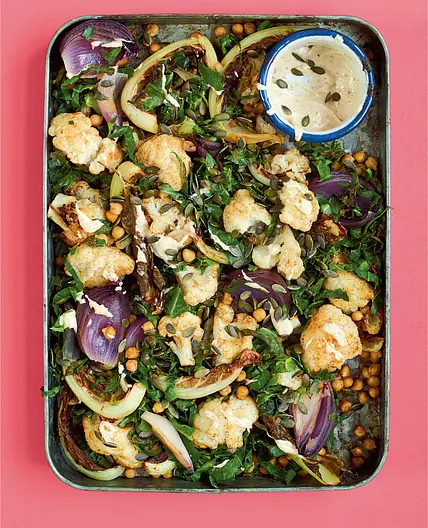 ROASTED CAULIFLOWER WITH CHICKPEAS, SPRING GREENS, LEMON & TAHINI