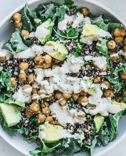 Kale quinoa bowl with spiced chickpeas