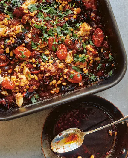 Charred tomatoes, onions and peppers with feta and harissa pine nuts