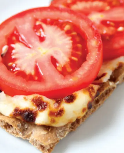 Tomato Cheese melt on a cracker