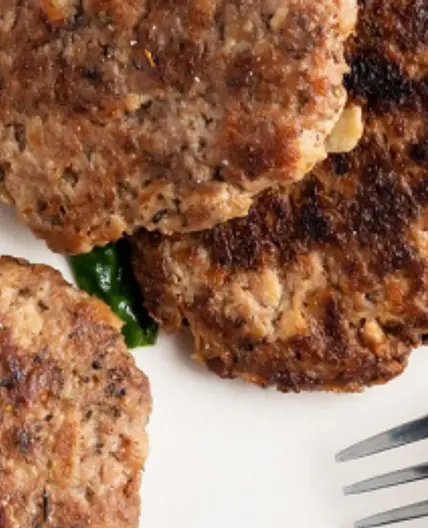 Apple Turkey Sausage Patties with Sauteed Greens