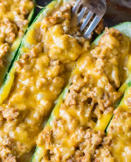 The Keto Guide - Cheeseburger Zucchini Boats
