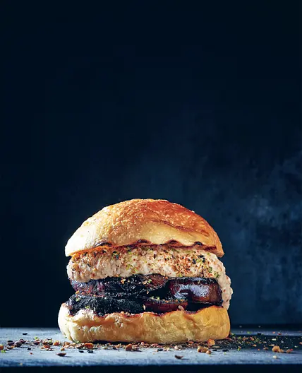 HARISSA-MARINATED AUBERGINE BURGER with baba ghanoush and dukkah