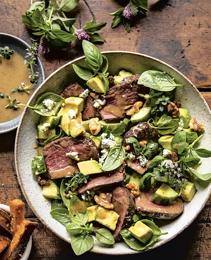 herby avocado steak salad with browned walnuts