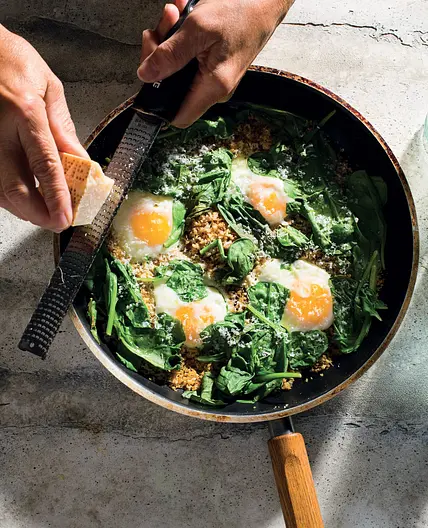 Eggs Fried in Parmesan Breadcrumbs with Wilted Spinach