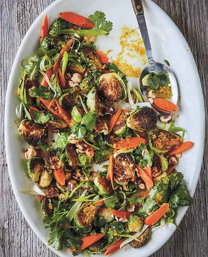 Brussels Sprouts with Pickled Carrots, Walnuts, Cilantro, and Citrus Vinaigrette