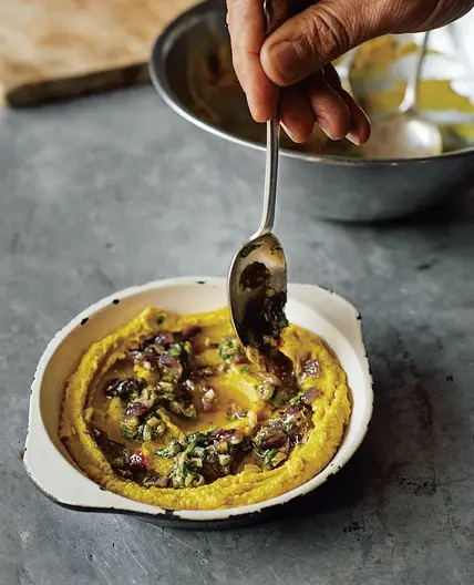 Yellow split pea purée with buttered onions and caper sauce