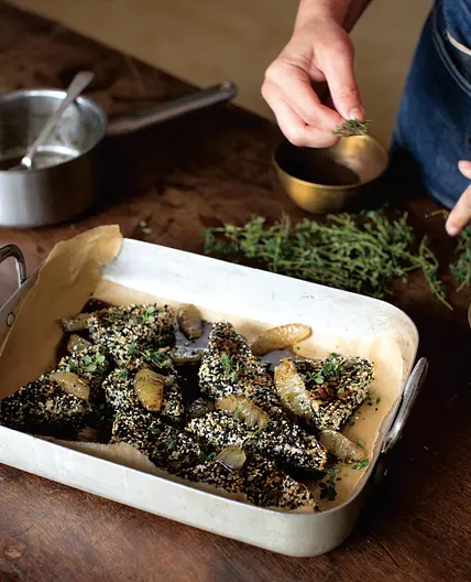 Sesame-crusted feta with black lime honey syrup