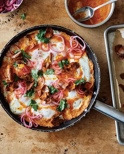 Sweet potato shakshuka with sriracha butter and pickled onions