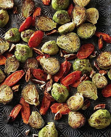 LEMON-ROASTED BRUSSELS SPROUTS & CARROTS WITH PECANS