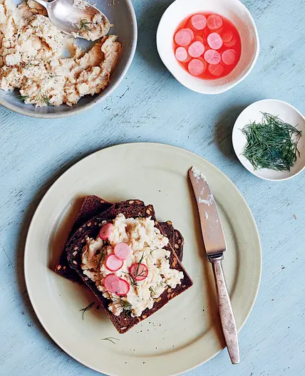 Crushed white bean and dill smørrebrød with quick-pickled radish