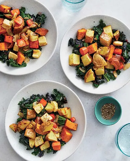 ROASTED ROOT VEGETABLES ON GARLIC– BRAISED GREENS