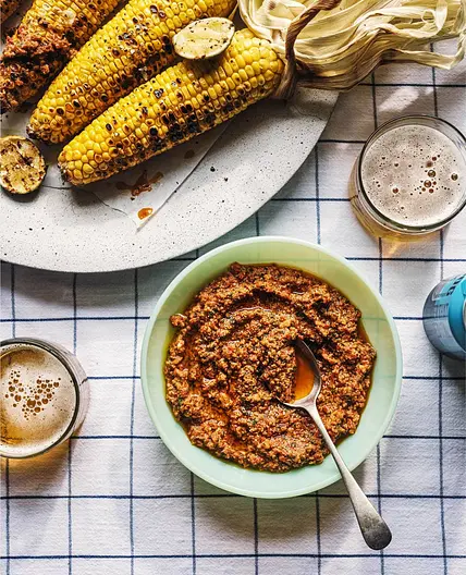 Black pepper-brined corn on the cob with romesco