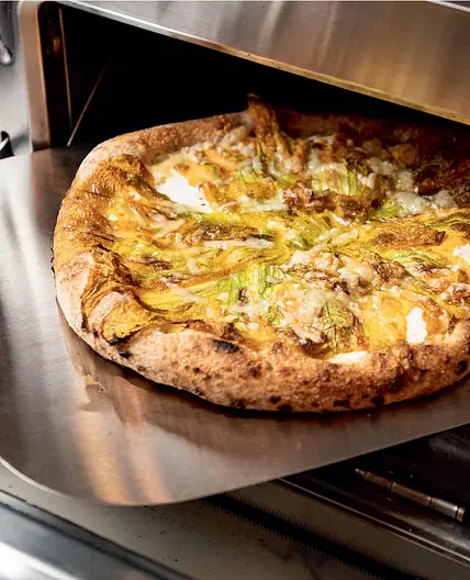Corn Pizza with Corn Béchamel and Pickled Peppers