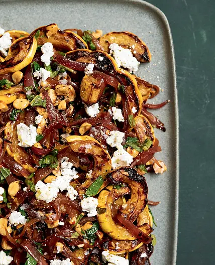 Roasted Delicata Squash with Hazelnuts, Spicy Onions, and Goat Cheese