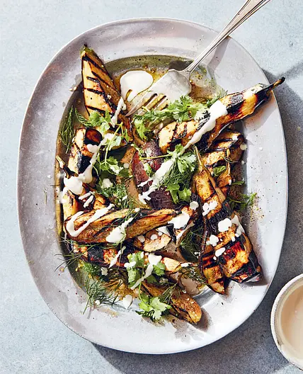 CHARRED EGGPLANT WITH ZA’ATAR AND YOGURT TAHINI