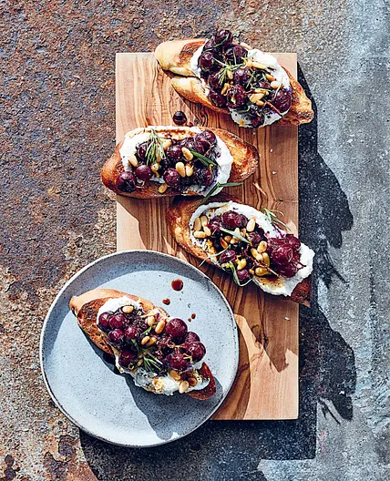 MEYER LEMON RICOTTA TOASTS WITH BLISTERED GRAPES