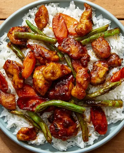 Stir-Fried Chicken & Vegetables with Rice & Soy-Chile Sauce