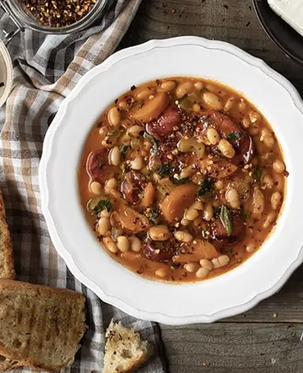 Greek white bean soup (Fasolada) with sausage