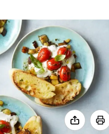 Aubergines met knoflook, gepofte tomaatjes en Jamaica chicken