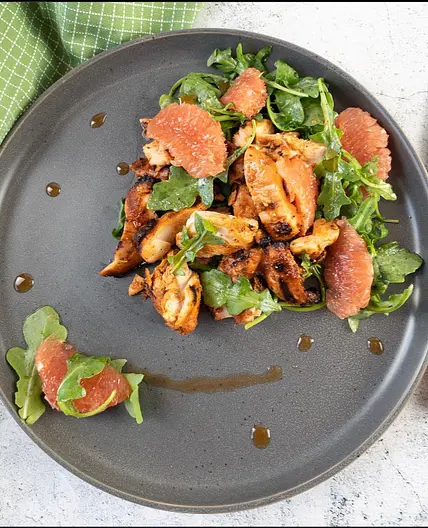 Harissa marinated chicken with red grapefruit salad