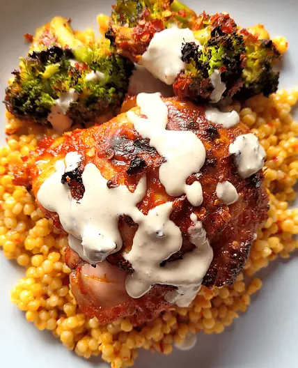 Honey Harissa Sheet Pan Chicken with Broccoli, Couscous, & Lemon Tahini Sauce